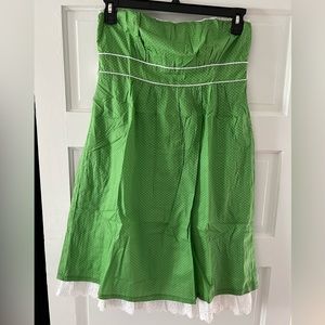 Strapless polka dot dress with ruffled petticoat